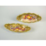 A pair of Royal Worcester fruit-decorated dishes