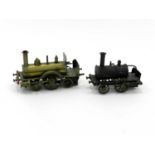 An early 20th century brass steam model locomotive, 20cm long and another similar, 20cm long (2)