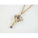 An early 20th century amethyst and seed pearl pendant on chain