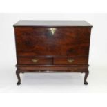 A good George II, solid mahogany, mule chest on stand, with re-entrant corners on the moulded