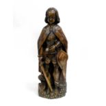 A Northern European carved oak figure of St.Michael,18th/19th century, modelled standing in armour