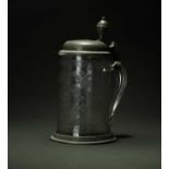 An 18th century glass and pewter-mounted tankard