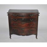A George III, French Hepplewhite style mahogany veneered, serpentine 4-drawer commode, the moulded