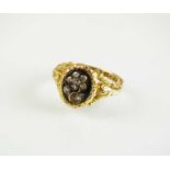 An 18ct gold William IV mourning ring