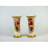 A pair of large Royal Worcester vases painted by Kitty Blake
