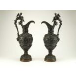 A pair of Rennaissance revival bronze wine ewers, 19th century