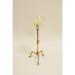 A W.A.S Benson style brass table/wall lamp, on adjusting angular tripod foot, with a flared ribbed