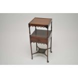 A small George III mahogany two-tier wash stand of small proportions