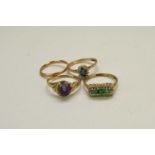 Four 9ct gold rings