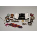A collection of various pieces of costume jewellery