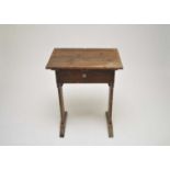 A small late Victorian oak lectern/desk, with a hinged top and shaped sides, 75cm high, 61 x 42cm.