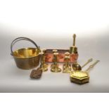 A collection of 19th century and later metal wares to include a large brass jam pan with iron loop