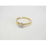 An 18ct gold single stone diamond ring