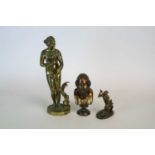 A cast brass study of Venus,the figure acompanies by a cherub astride a dolphin, after the