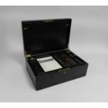 A good Edwardian leather document case, the hinged cover with a flush-fitting brass handle and