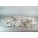 A large collection of good quality antique and later linen and textiles to include embroidered and
