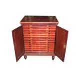 A Victorian mahogany collector's or specimen cabinet, with hinged panelled doors opening to reveal