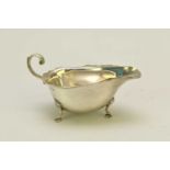 An Asprey & Co silver sauce boat