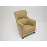 A small upholstered tub armchair, 85cm high, 63cm wide, 35cm seat height.