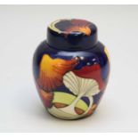 A Moorcroft ginger and jar and cover early 21st century tubelined with orange and red mushrooms
