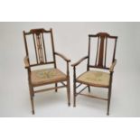 An Edwardian mahogany elbow chair with strung borders, together with another similar (2)