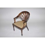 An Edwardian rosewood elbow chair, wih fan-shaped back, inlaid detail and fixed upholstered seat,