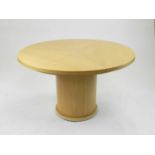 A Danish Skovby extending segmental pedestal dining table, in beech finish, 120cm dia closed,