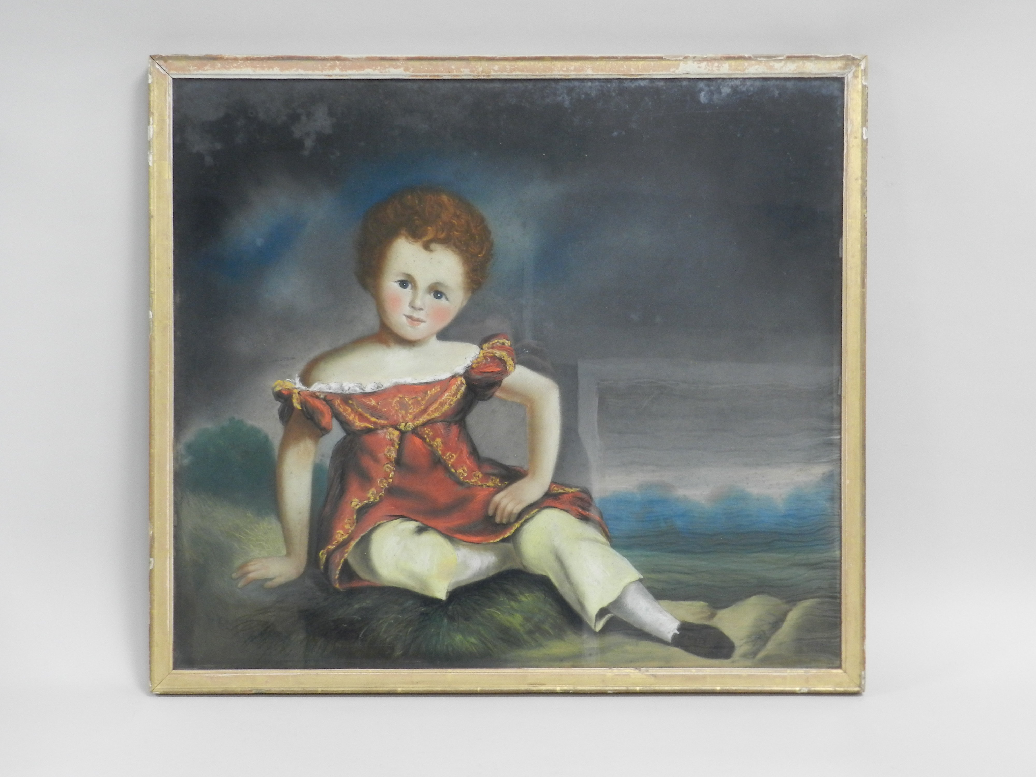 Naive School, 19th century, Portrait of a child sitting in a landscape, label verso, Orlando