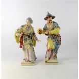 A pair of large Meissen-style figures