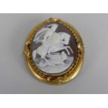 An oval shell cameo brooch