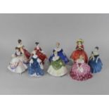 A collection of twenty-one Royal Doulton ladies