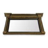 A reproduction giltwood wall mirror, the plain plate within a reeded frame flanked by moulded