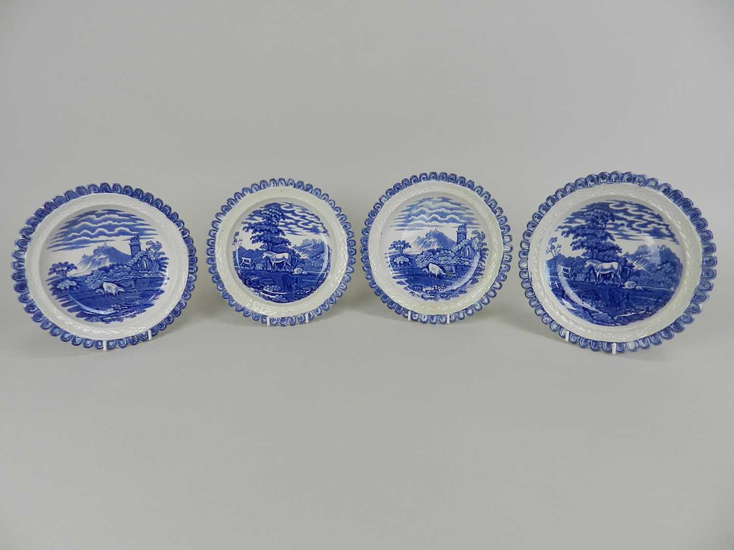 Twelve Adams blue and white plates