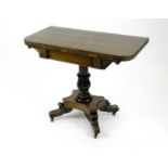 A William IV rosewood card table, with reeded sabre legs, 91.5cm wide x 46cm deep x 75cm high