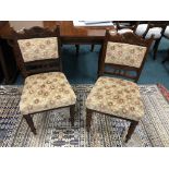 A set of four late Victorian upholstered walnut side chairs (4)