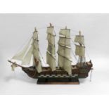 A late 20th Century model of a four-masted warship, 75cm long, 52cm high.