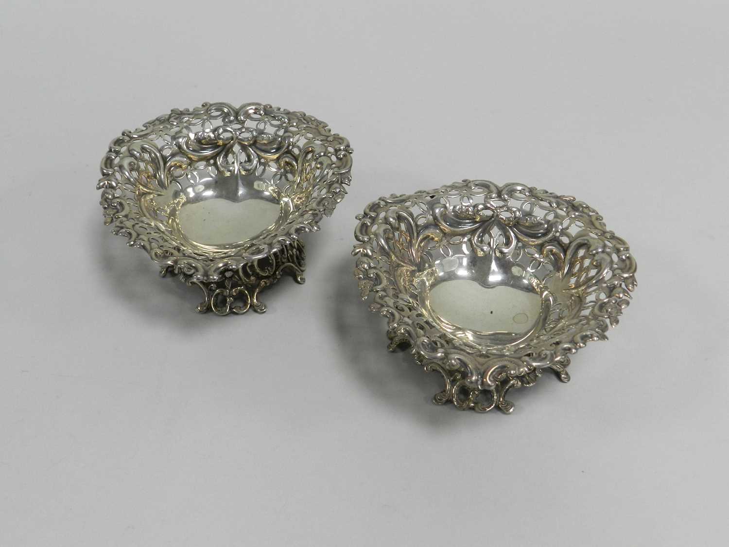 A pair of Victorian silver sweetmeat dishes