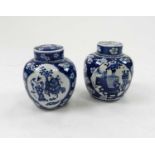 A pair of 19th century, Kangxi style, blue and white ginger jar and covers, 20cm high (4)