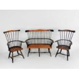 Three model or apprentice chairs, of Windsor type in stained wood, including two open armchairs