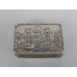 A silver castle top pill box