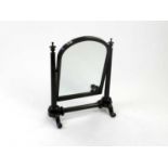 A late Victorian mahogany swing dressing table mirror, circa 1870-80, the arch-top plate within a