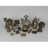 An assembled group of near Eastern, Chinese and Tibetan metalwares, including food vessels, ewers,