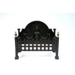 A reproduction cast iron fire basket