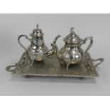 A silver plated teapot and coffee pot