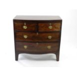 A 19th century mahogany veneered bowfronted chest of drawers, 99cm wide