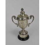 A silver presentation trophy cup