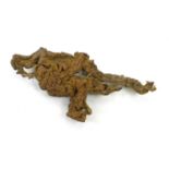 A Chinese scholar's natural wood root, Qing Dynasty, probably tea wood of pale reddish-brown hue and