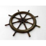 A brass bound teak ship's wheel, 94cm dia.