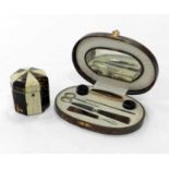 A late Edwardian leather cased manicure set with tortoiseshell fittings, together with a small