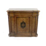 A Victorian figured walnut breakfront pier type cabinet with a parcel ebonised marquetry frieze